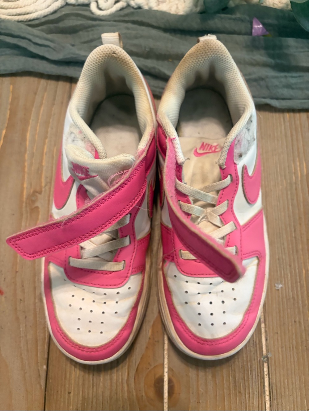 Nike Dunk Low sneakers in white and bright pink